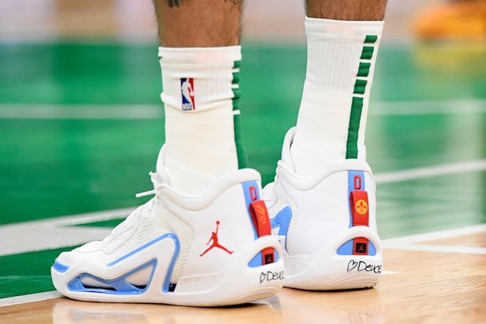 View of Jayson Tatum's white and blue Jordan sneakers.